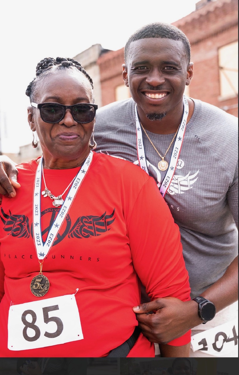 Intergenerational moment with senior runner and Jackie